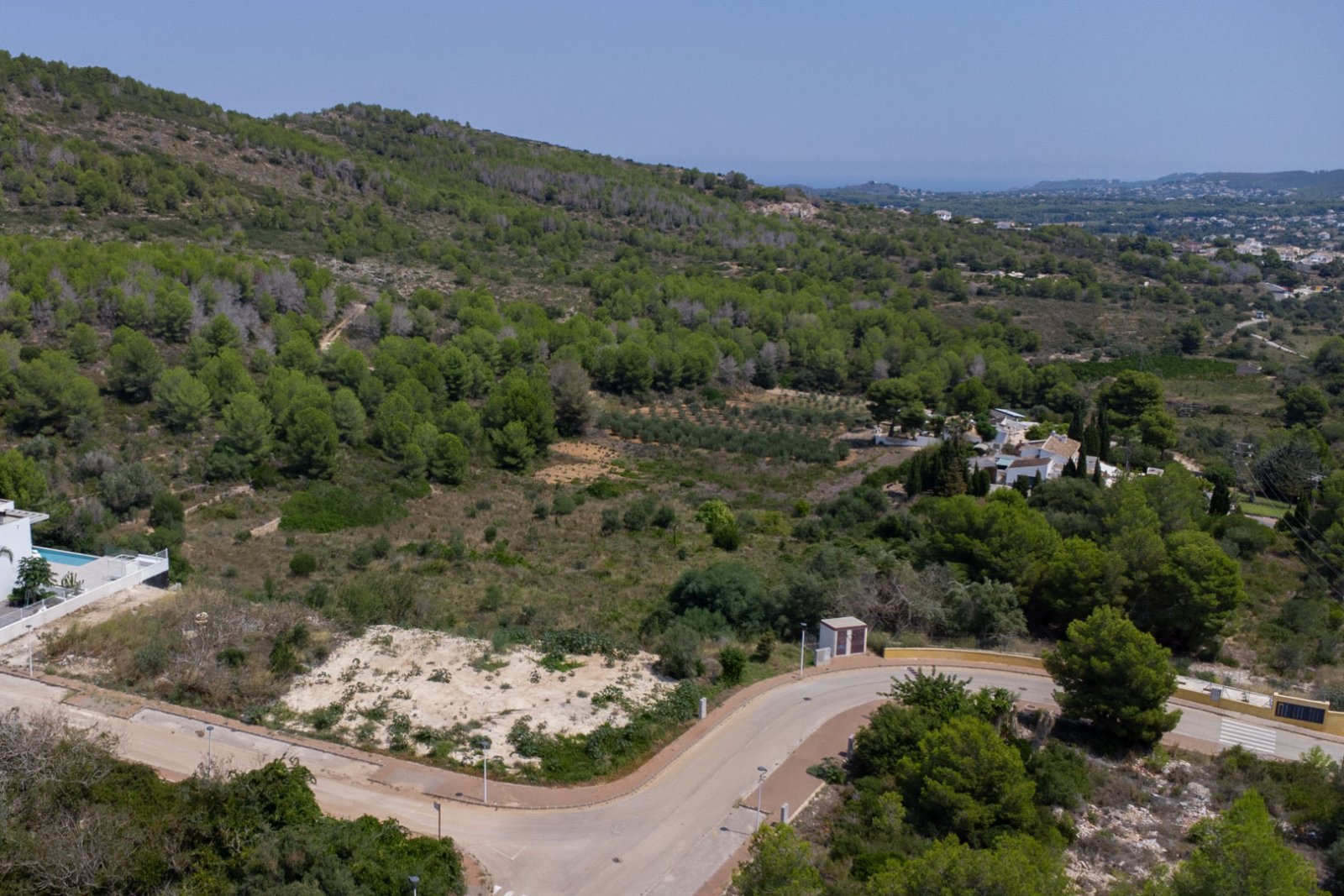 4557BELL Flaches Baugrundstück mit freiem Blick zum Verkauf in Racó de Nadal, Benitachell